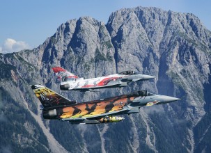 A “Bavarian Tiger” from 74 Tactical Air  Wing, Neuburg/Donau  together with the  “Austrian Tiger” from  Zeltweg over the Alps